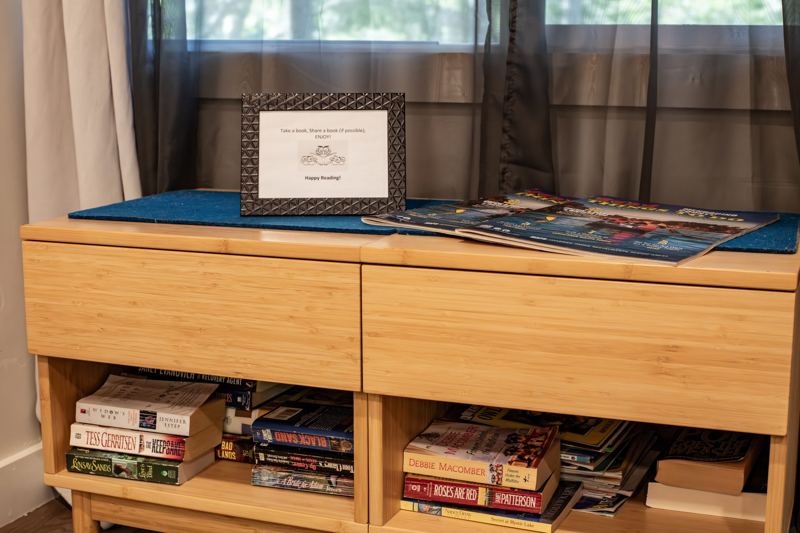 Shelf of books and board games
